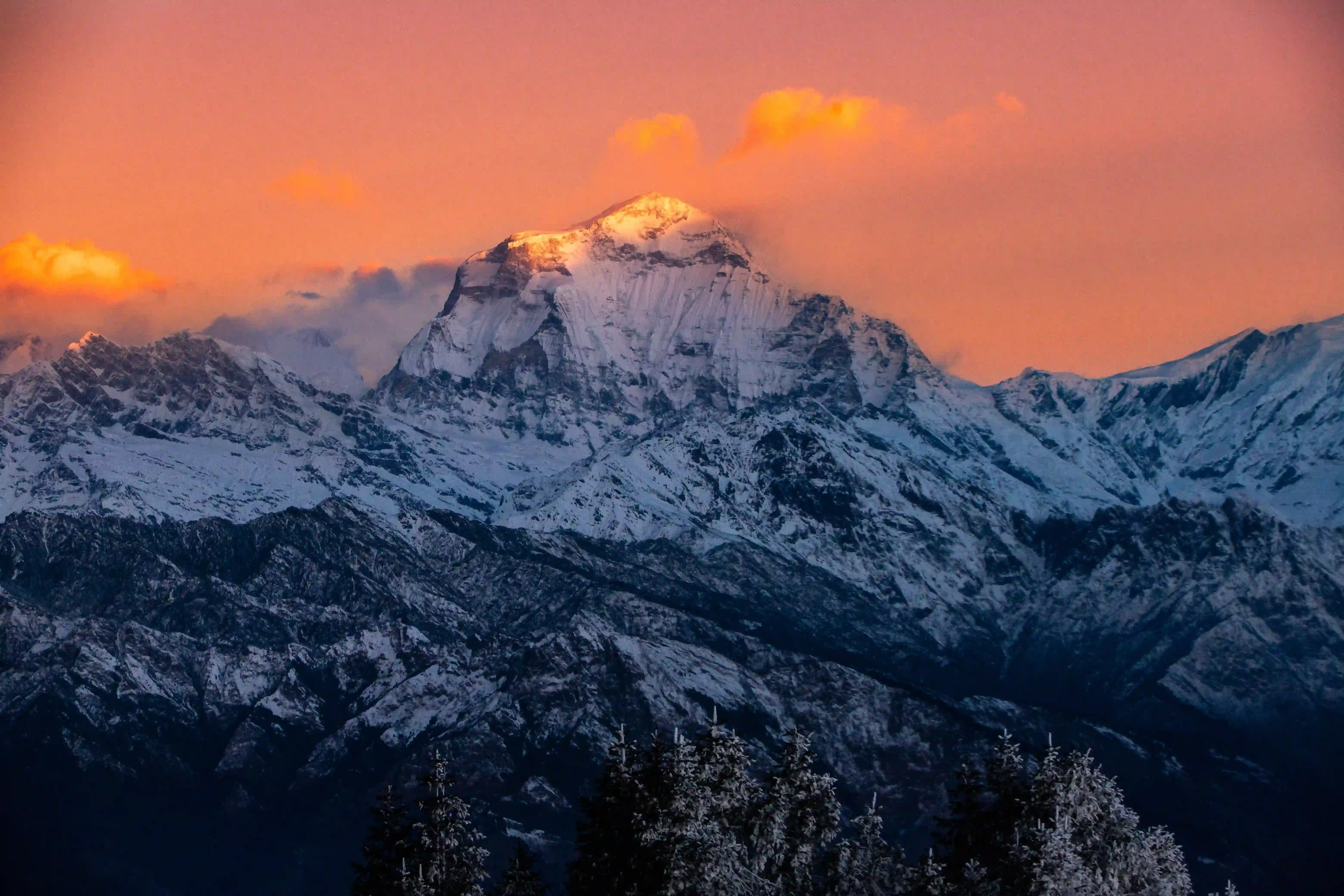 Panoramic sunrise view from Poon Hill viewpoint with Annapurna and Dhaulagiri ranges